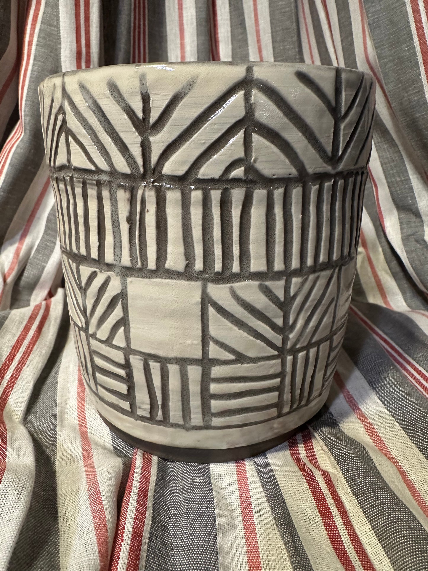 Carved utensil holder